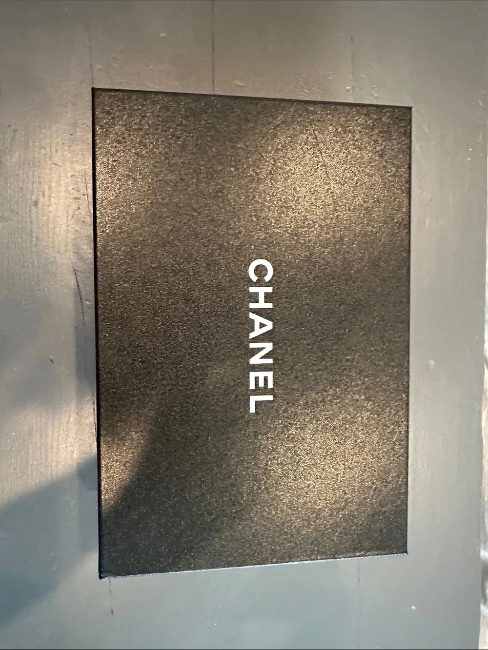 CHANEL Black and Beige Crochet Cap-Toe Ballet Flats